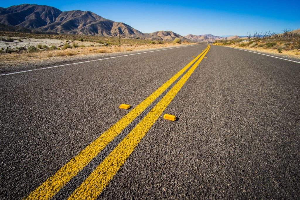 Crossing Double Yellow Lines in California CVC 21460 Laws